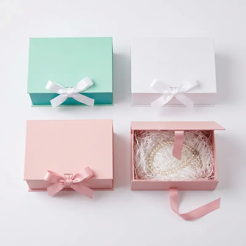 custom magnetic rigid gift boxes with satin ribbon closure in mint white and pink LuxoPack wholesale China